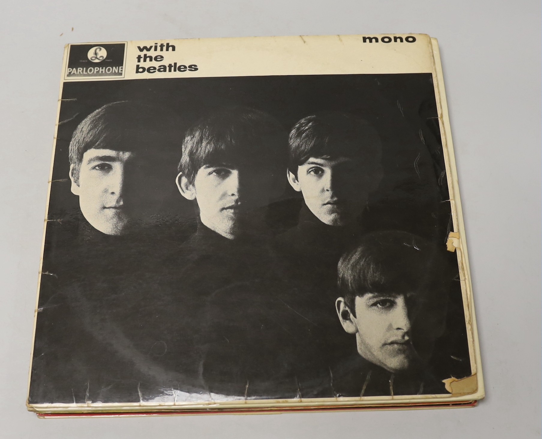 A collection of five Beatles LP’s to include top opening White Album